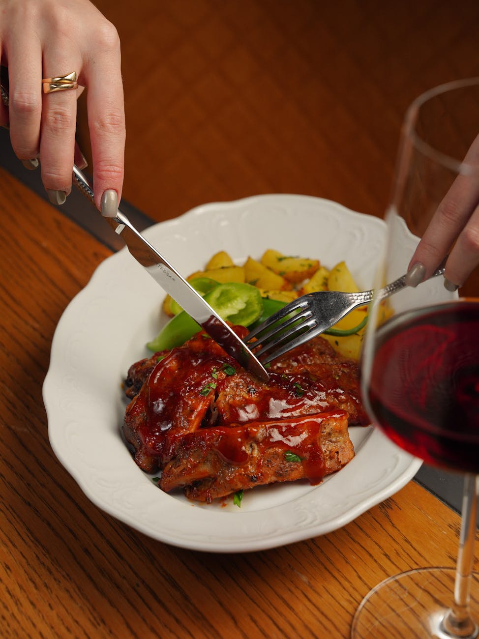 close up of savory pork dish with wine